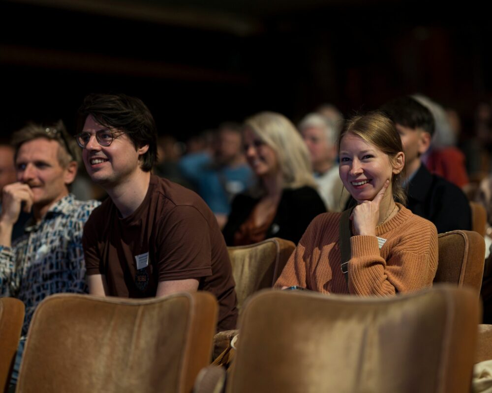 Participants dynamiques lors de l'événement coopératif Coopday 2025 organisé par FEBRAP et Febecoop